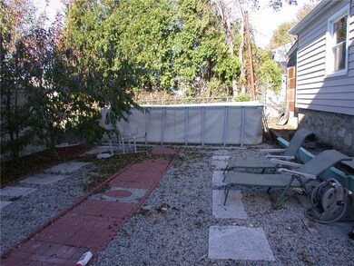 Yard and above ground pool and patio area