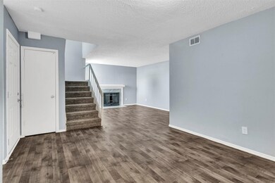 Dining area w/ living room beyond