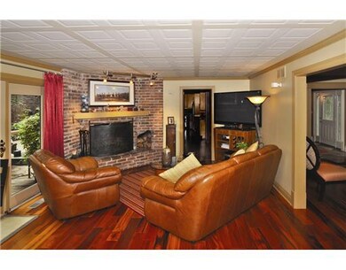 Family Room. Custom ceiling gives texture and warm