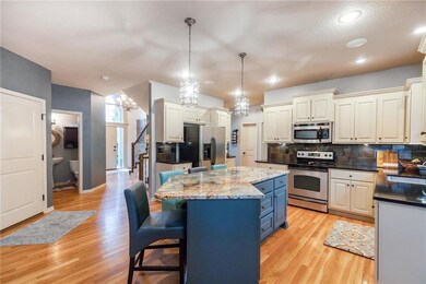 Continue to the expansive eat-in kitchen with hard