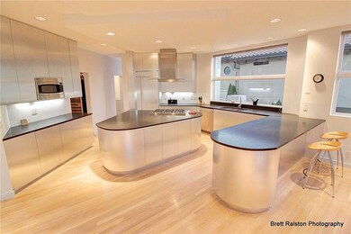 Open, spacious kitchen with large center island an