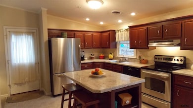 Walk out to side yard off kitchen