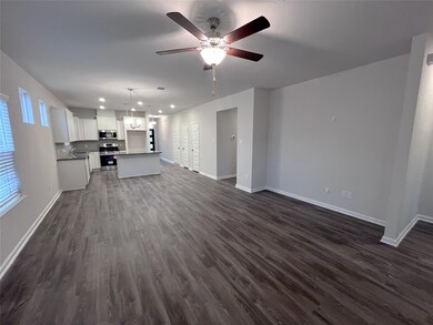 The Kettering II- Family Room into the Kitchen. Ho