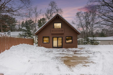 8370 W Sea Pine Dr, Mears, MI 49436 - photo 2