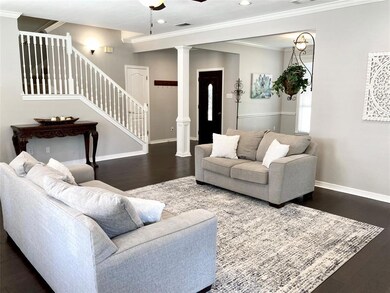 Living room looking into Formal Dining & Front Foy
