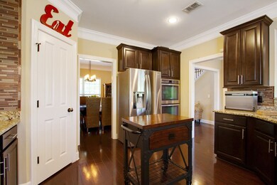 Stainless appliances, double ovens, brand new refrigerator and a pantry!