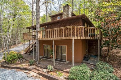 Front of home showing wrap around deck