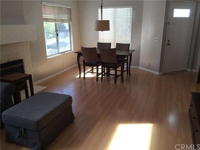 Living and dining room with gas fireplace