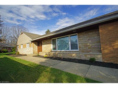 This brick ranch has 5 large bedrooms and three fu