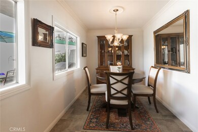 Very bright dining room adjacent to the kitchen.