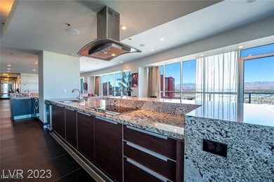 Kitchen with island range hood, black electric sto