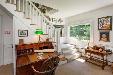 Entry hall is spacious enough to be...