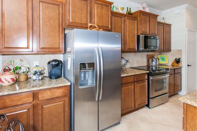 Kitchen w/Granite Tops & SS Appliances