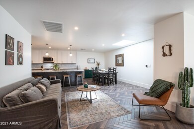 Cozy Sitting Area leads to Kitchen