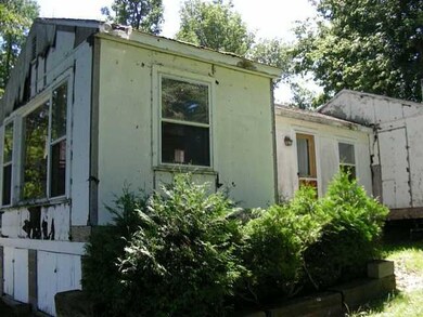 Exterior Front. The existing cottage was a great r