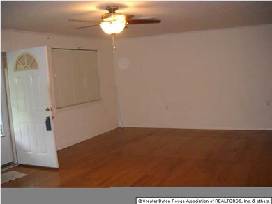 other end of Den which could accomodate a dining t