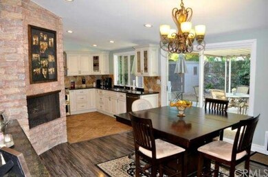 Dining room with fireplace and view of newly remod