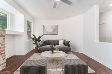 Sitting room featuring wood finished floors, ceili