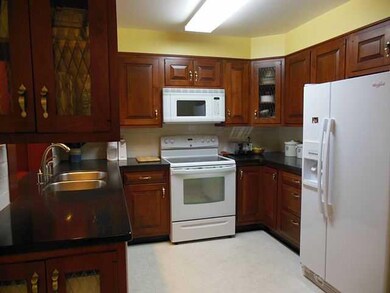 Kitchen Updated kitchen with solid surface counter