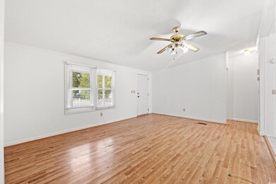 Unfurnished room featuring ceiling fan and light h