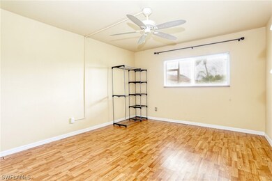 Large Master Bedroom features wood laminate floori