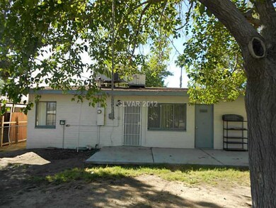 Exterior Back. Back of home with patio and laundry
