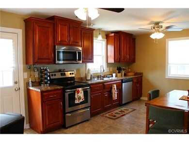 Beautiful cherry cabinets and stainless steel appl