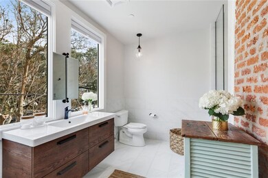 Large modern bathroom with tons of natural light.