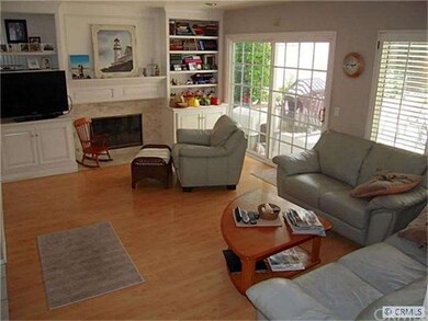 The step down large family room features a custom 