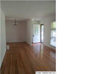 LARGE LIVINGROOM WITH DINING AREA.