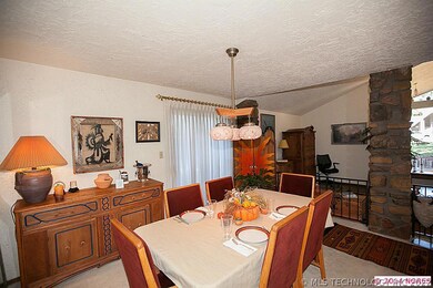 Formal dining room with patio doors leading to wra