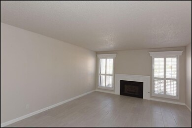 Living Room with custom fireplace with p