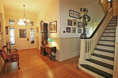 The center hall entry allows your family privacy..