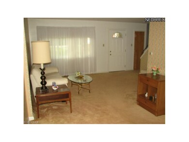 Spacious living room with large picture window tha
