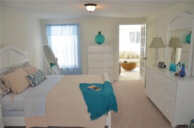 First floor master bedroom with...