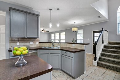 Kitchen is open with island and a nice pantry