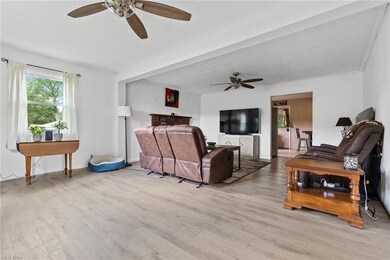 Spacious front living room with updated LVT floori