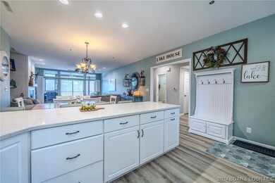 Bedrooms through opening and down hallway