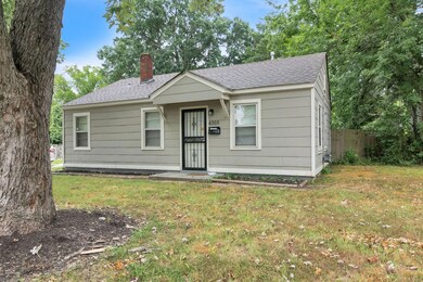 View of front of home featuring a front lawn