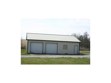 30 X 40 DET GARAGE W/3 OH DOORS; CC FLR, ELECT