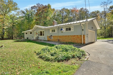 14705 Hubbard Rd, Burton, OH 44021 - photo 2