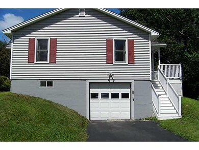 Exterior Back. Steps to deck with...