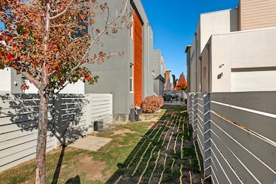 View of property exterior featuring a fenced backyard and stucco siding