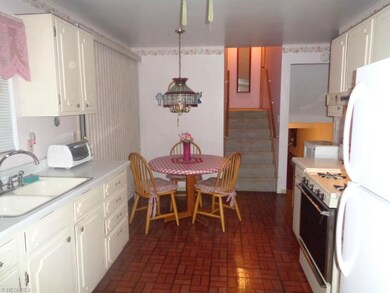 *INVITING KITCHEN WITH ACCESS TO UPSTAIRS BEDROOMS & LOWER-LEVEL*