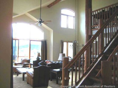 Living Room. Dramatic light-filled space welcomes