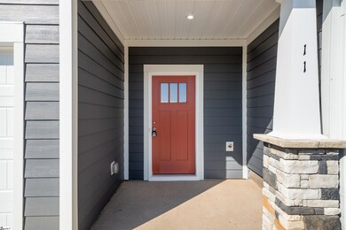 Stone Wrapped Column Front Porch. *Model Home-For 
