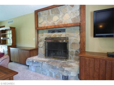 You will love the natural stone raised hearth wood