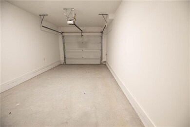 HUGE Car Garage providing endless options for overhead storage