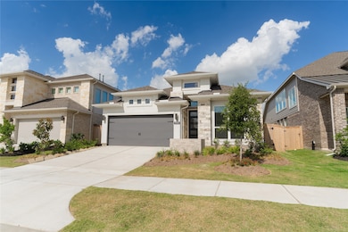 This modern home features a sleek exterior with a