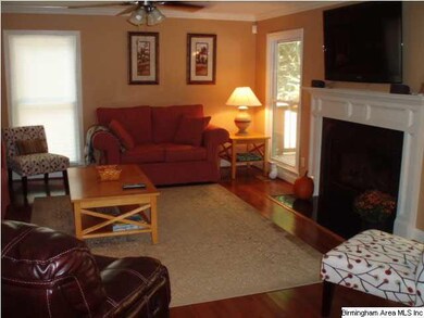 The den or family room has the beautiful hardwood 